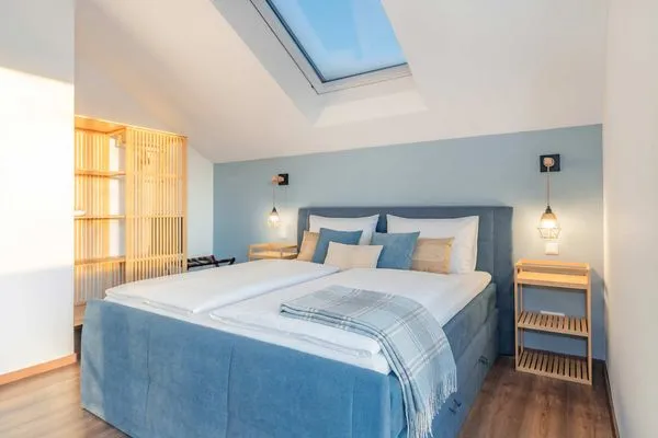 Schlafzimmer  Ferienhaus "Haffhus" mit Balkon, Terrasse und 2 Bädern