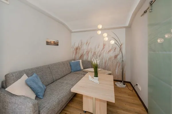 Wohnzimmer Villa Luna Ferienwohnung Achterdeck nur 50 Meter zum Strand mit Sonnenterrasse