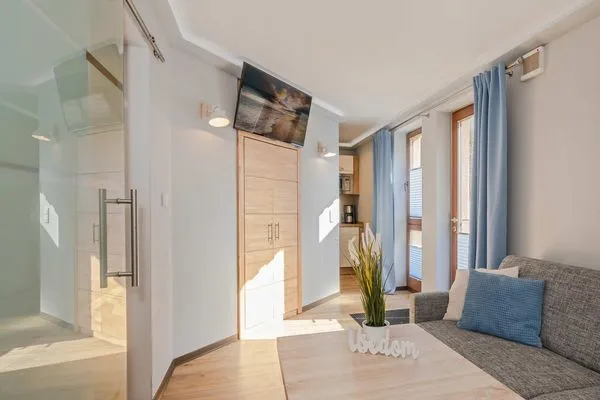 Wohnzimmer Villa Luna Ferienwohnung Achterdeck nur 50 Meter zum Strand mit Sonnenterrasse