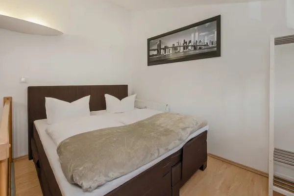 Schlafzimmer Villa Luna Ferienwohnung Achterdeck nur 50 Meter zum Strand mit Sonnenterrasse