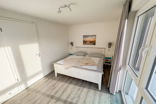 Zweites Schlafzimmer mit Doppelbett  Inselblick (E014)