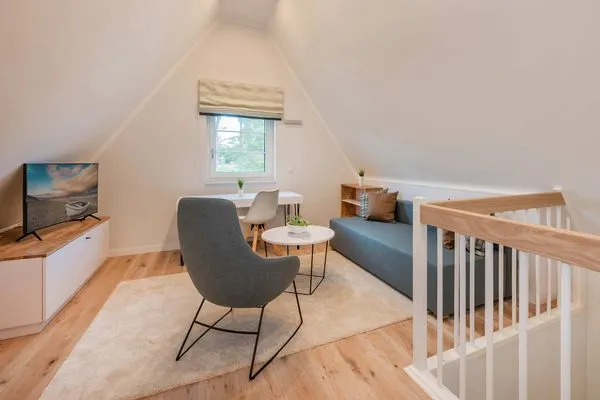 Wohnzimmer  Ferienhaus Haffglück mit Sauna, Kamin und Terrasse mit Haffblick
