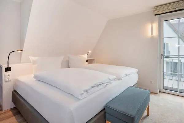Schlafzimmer  Ferienhaus Haff-Traum mit Kamin, Sauna und Terrasse