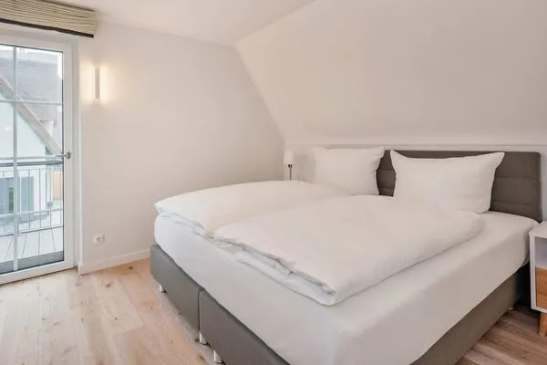Schlafzimmer  Ferienhaus Haff-Traum mit Kamin, Sauna und Terrasse