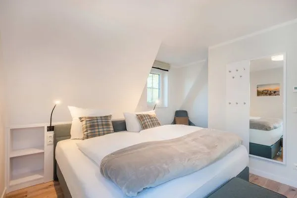 Schlafzimmer  Ferienhaus Haff-Sommer mit Kamin, Sauna und Terrasse