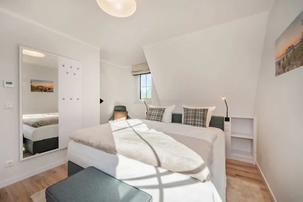 Schlafzimmer  Ferienhaus Haff-Liebe mit Sauna, Kamin und Sonnenterrasse