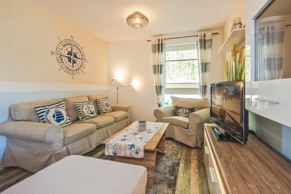 Wohnzimmer  Ferienwohnung Inselzeit auf 2 Etagen mit Strandkorb und Balkon