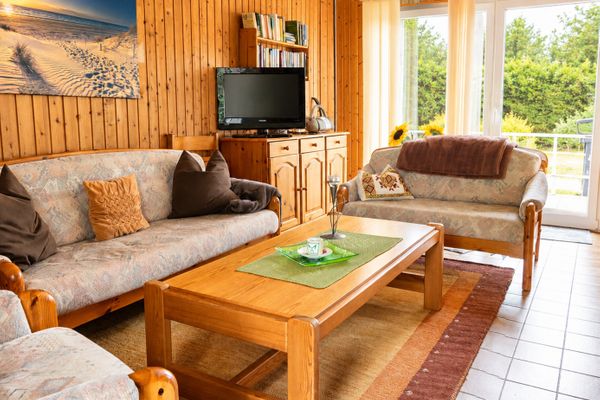  Ferienhaus Scholle Dornumersiel - Wohnzimmer
