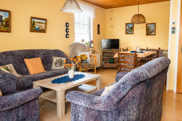  Ferienhaus Scholle Dornumersiel - Wohnzimmer