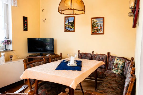  Ferienhaus Scholle Dornumersiel - Wohnzimmer