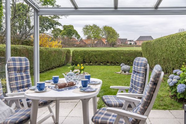  Ferienhaus Mühlenblick 37 Carolinensiel - Terrasse