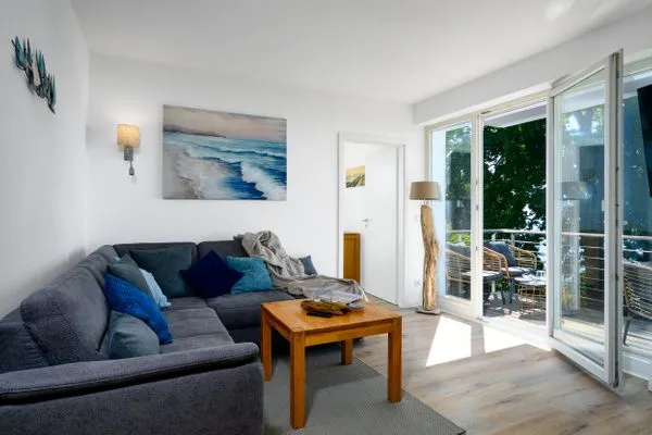 Wohnzimmer  FeWo Tag am Meer - Kamin, Sauna, Meerblick