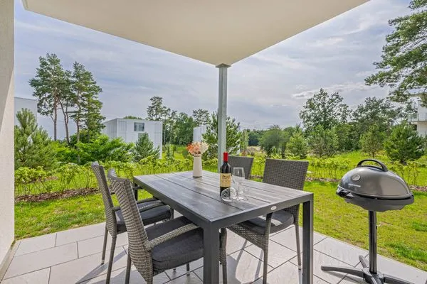 Terrasse  Ferienwohnung Haffkoje Fitness, Sauna und Kinderspielbereich