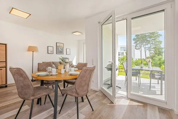 Wohnzimmer  Ferienwohnung Haffkoje Fitness, Sauna und Kinderspielbereich