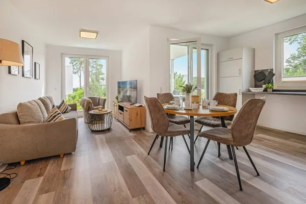 Wohnzimmer  Ferienwohnung Haffkoje Fitness, Sauna und Kinderspielbereich
