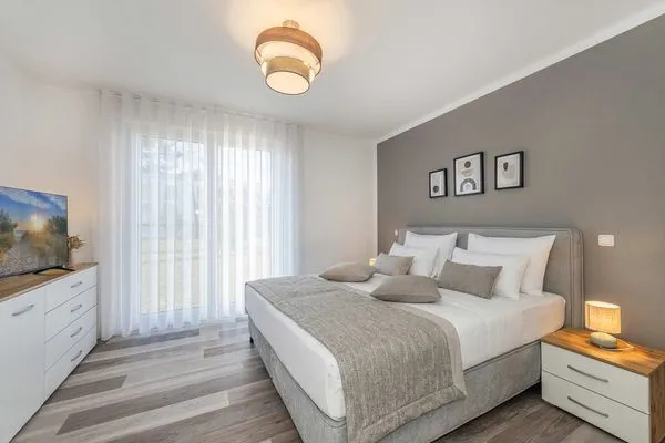 Schlafzimmer  Ferienwohnung Haffkoje Fitness, Sauna und Kinderspielbereich