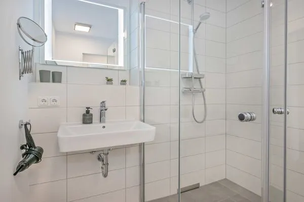 Badezimmer  Ferienwohnung Haffkoje Fitness, Sauna und Kinderspielbereich