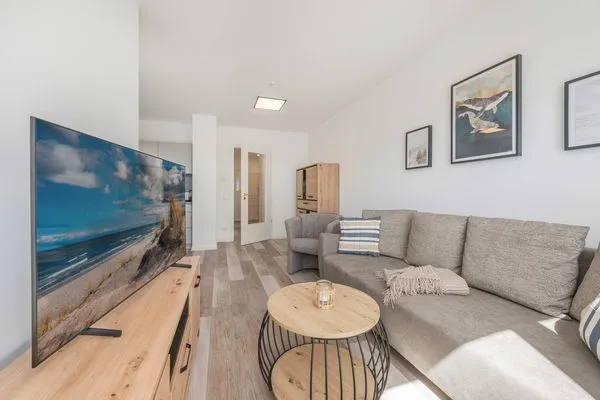 Wohnzimmer  Ferienwohnung Haffkoje Fitness, Sauna und Kinderspielbereich