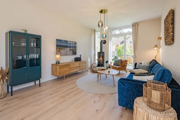 Wohnzimmer  Ferienhaus Reethus bei den Wassern mit Sauna, Kamin und Terrasse