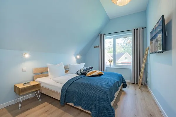 Schlafzimmer  Ferienhaus Reethus bei den Wassern mit Sauna, Kamin und Terrasse