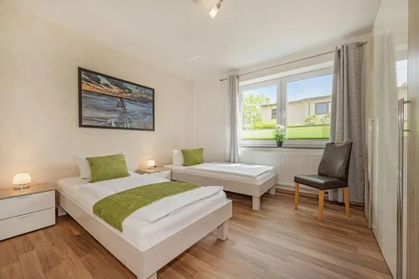 Schlafzimmer  Ferienwohnung Stranddüne nur 800 m zum Strand mit Terrasse
