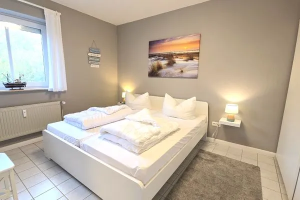 Schlafzimmer  Ferienwohnung "Lieblingsplatz" in Kalifornien an der Ostsee