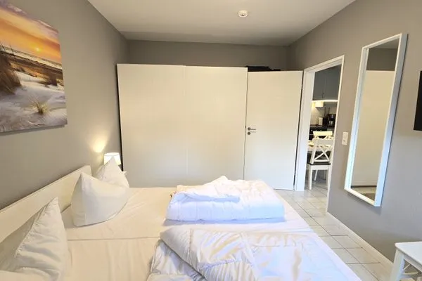 Schlafzimmer  Ferienwohnung "Lieblingsplatz" in Kalifornien an der Ostsee