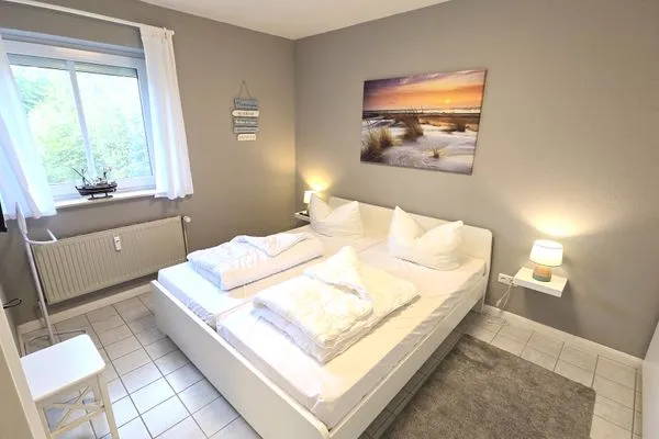Schlafzimmer  Ferienwohnung "Lieblingsplatz" in Kalifornien an der Ostsee
