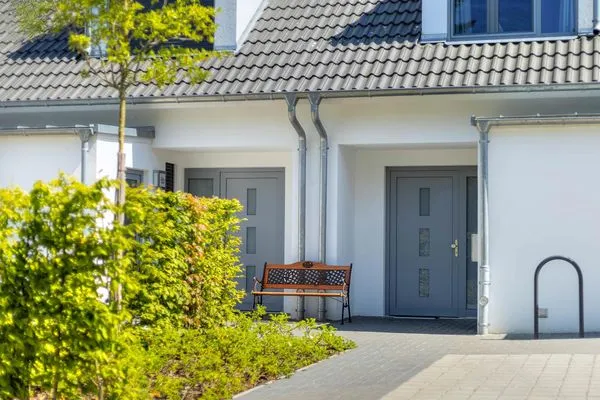 Fassade / Eingang  Ferienhaus Nordhorn mit Sonnenterrasse, 2 Schlafzimmern & Strandkorb