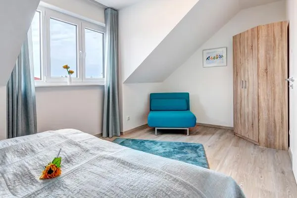 Schlafzimmer  Ferienhaus Nordhorn mit Sonnenterrasse, 2 Schlafzimmern & Strandkorb