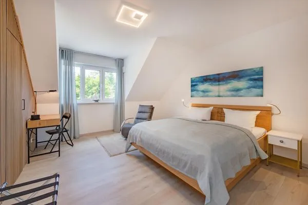 Schlafzimmer  Ferienhaus Nordhorn mit Sonnenterrasse, 2 Schlafzimmern & Strandkorb