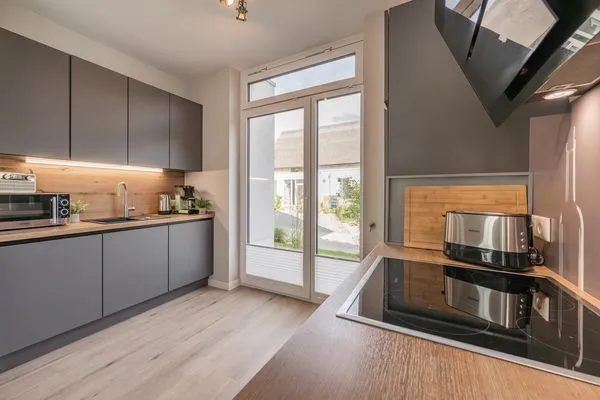 Küche / Küchenzeile  Störtebekers Reethus mit Sauna, Kamin und Terrasse
