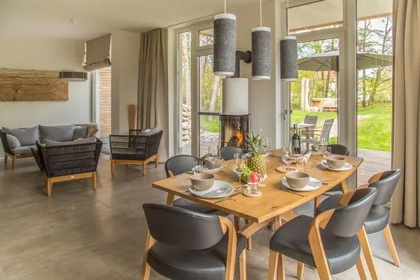 Wohnzimmer  Ferienhaus Reethäus'l mit Whirlpool, Sauna, Kamin und Terrasse