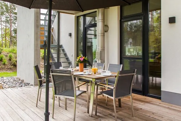 Terrasse  Ferienhaus Reethäus'l mit Whirlpool, Sauna, Kamin und Terrasse