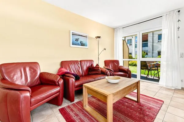 Wohnbereich mit Zugang zur Terrasse Residenz am Strand Wohnung 4-58