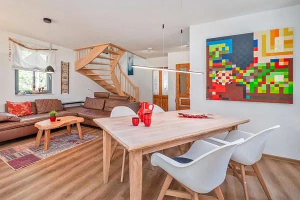 Wohnzimmer  Ferienhaus Auszeitfischer mit Sauna, Kamin und Terrasse