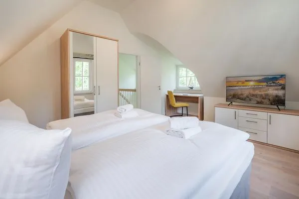 Schlafzimmer  Ferienhaus Seeadler mit Kamin, Sauna und Terrasse