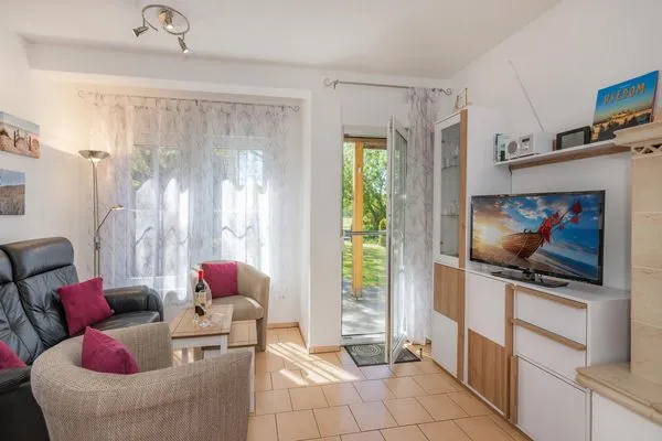 Wohnzimmer  Ferienwohnung Inselzauber nur 250 m zum Strand mit Terrasse und Kamin