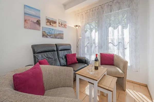 Wohnzimmer  Ferienwohnung Inselzauber nur 250 m zum Strand mit Terrasse und Kamin