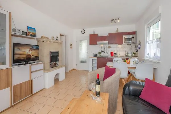 Wohnzimmer  Ferienwohnung Inselzauber nur 250 m zum Strand mit Terrasse und Kamin
