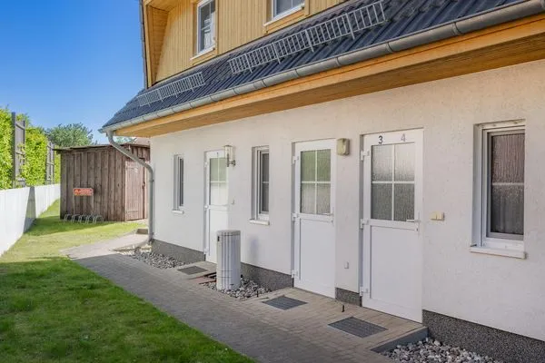 Fassade / Eingang  Ferienwohnung Inselzauber nur 250 m zum Strand mit Terrasse und Kamin