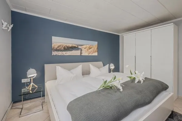 Schlafzimmer  Ferienwohnung Sanddorn mit Terrasse und nur 400 m zum Strand