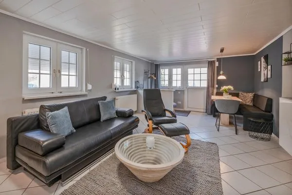 Wohnzimmer  Ferienwohnung Sanddorn mit Terrasse und nur 400 m zum Strand