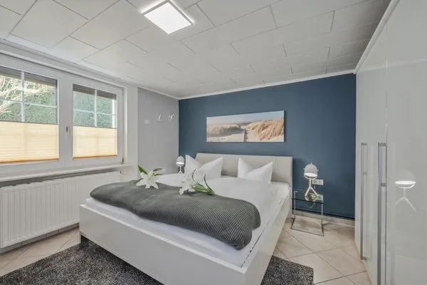 Schlafzimmer  Ferienwohnung Sanddorn mit Terrasse und nur 400 m zum Strand