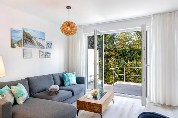 Wohnzimmer  Ferienwohnung Ostseenest Bernstein mit Terrasse & nur 800 m zum Strand
