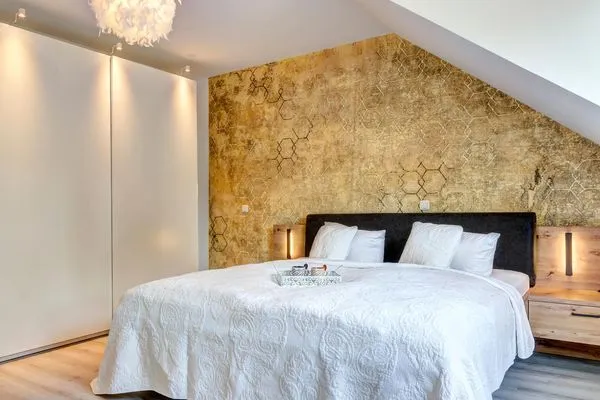 Schlafzimmer  Ferienwohnung Ostseenest Bernstein mit Terrasse & nur 800 m zum Strand