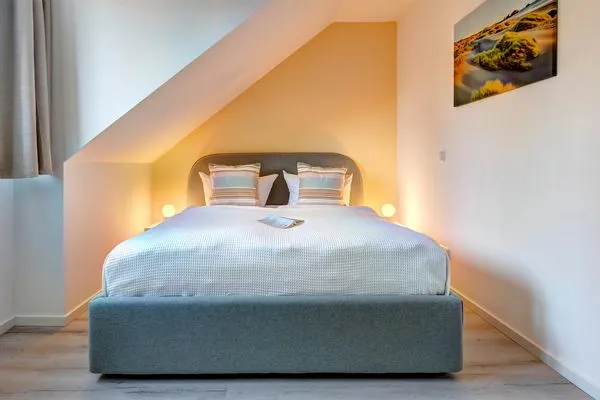 Schlafzimmer  Ferienwohnung Ostseenest Bernstein mit Terrasse & nur 800 m zum Strand