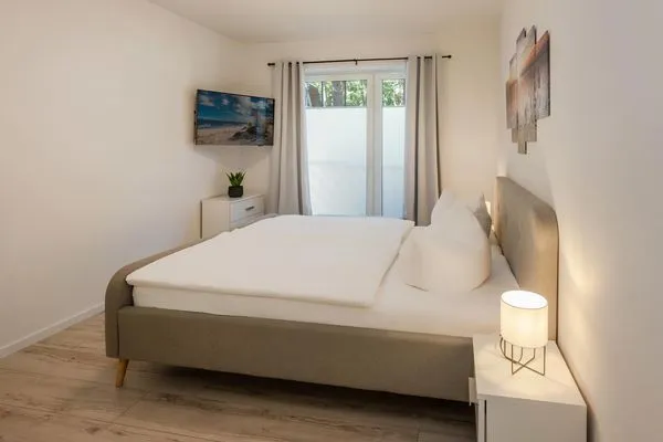 Schlafzimmer  Ferienwohnung Achterliek nur 300 m zum Strand mit Balkon
