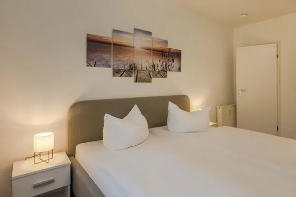 Schlafzimmer  Ferienwohnung Achterliek nur 300 m zum Strand mit Balkon