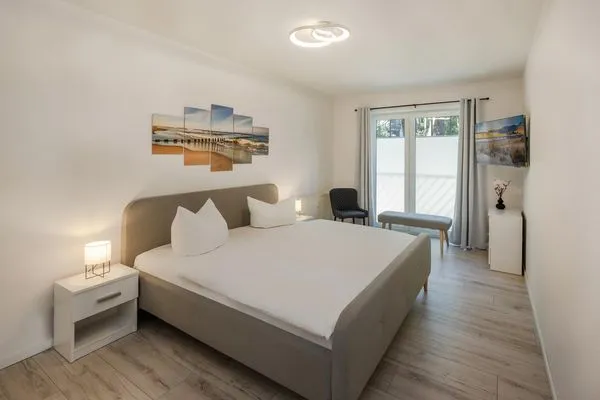 Schlafzimmer  Ferienwohnung Achterliek nur 300 m zum Strand mit Balkon